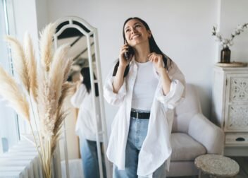 Cheerful woman talking on smartphone